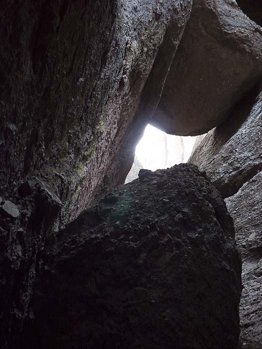 Exiting a talus cave